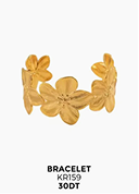 Bracelet manchette doré à motifs floraux