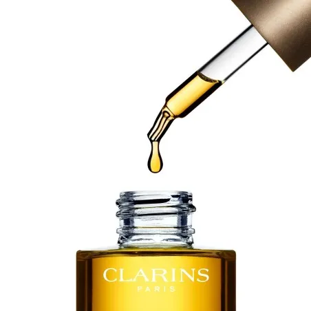 Huile de corps CLARINS  SOIN SANTAL PEAUX SÈCHES CLARINS 30 ML - CLARINS